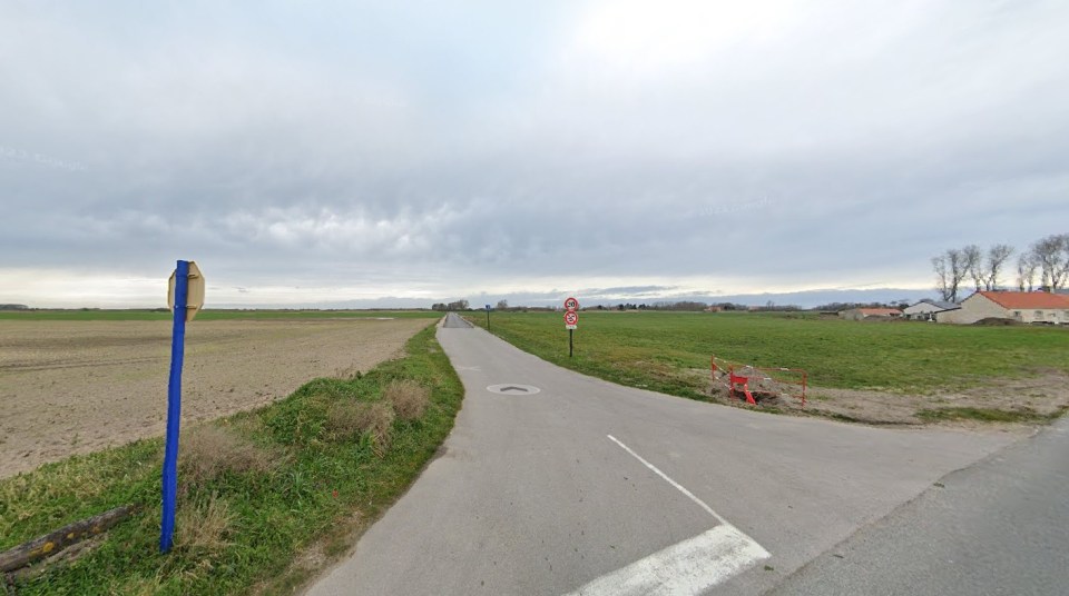 Road with barriers near Calais, France.