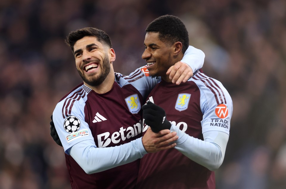 Aston Villa players celebrating a goal.