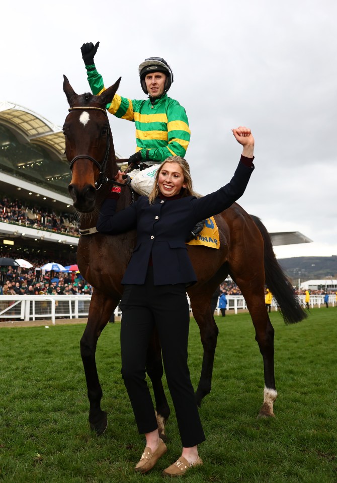 Mark Walsh and a woman celebrating a horse race win.