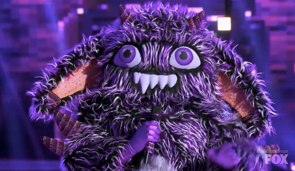 The Masked Singer contestant in a purple monster costume.