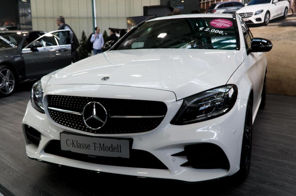 White Mercedes-Benz C-Class T-Model at a car show.