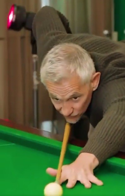 Man playing pool.