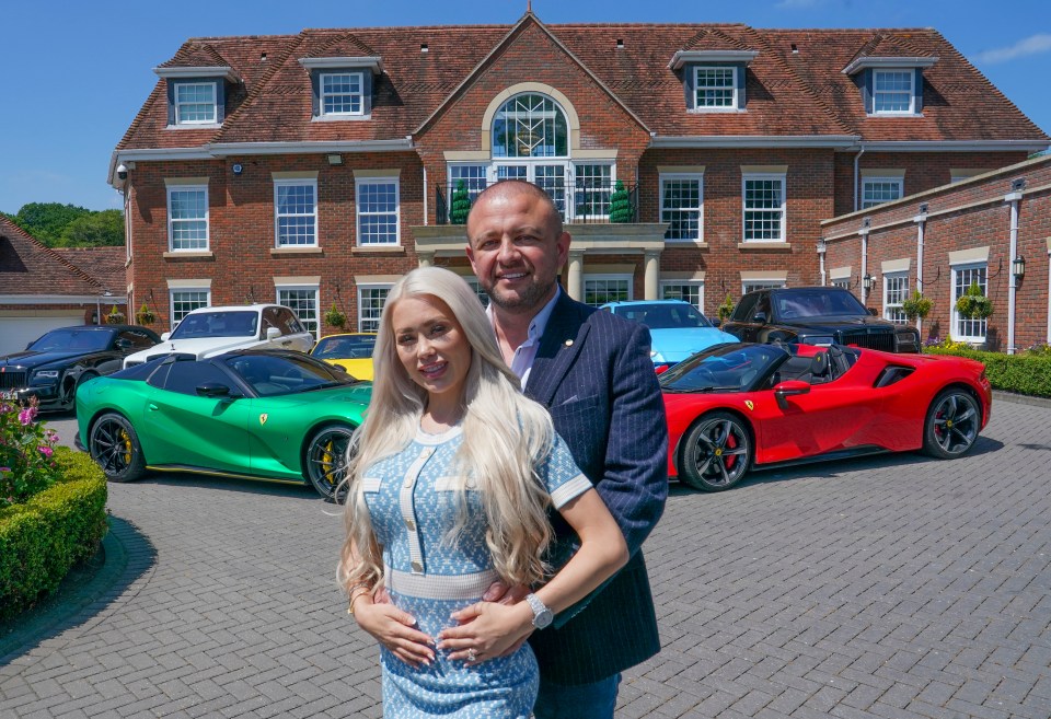 Bob Bull and his fiancée in front of their home and luxury cars.