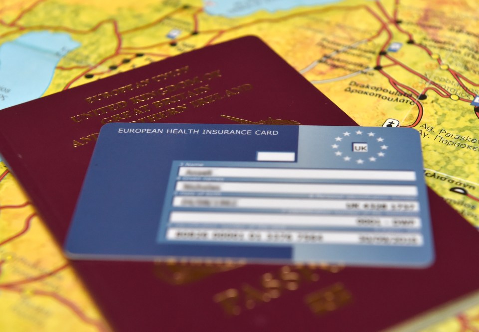 UK European Health Insurance Card on a passport.