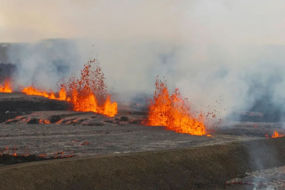 An image collage containing 1 images, Image 1 shows Aerial view of a volcanic eruption in Iceland