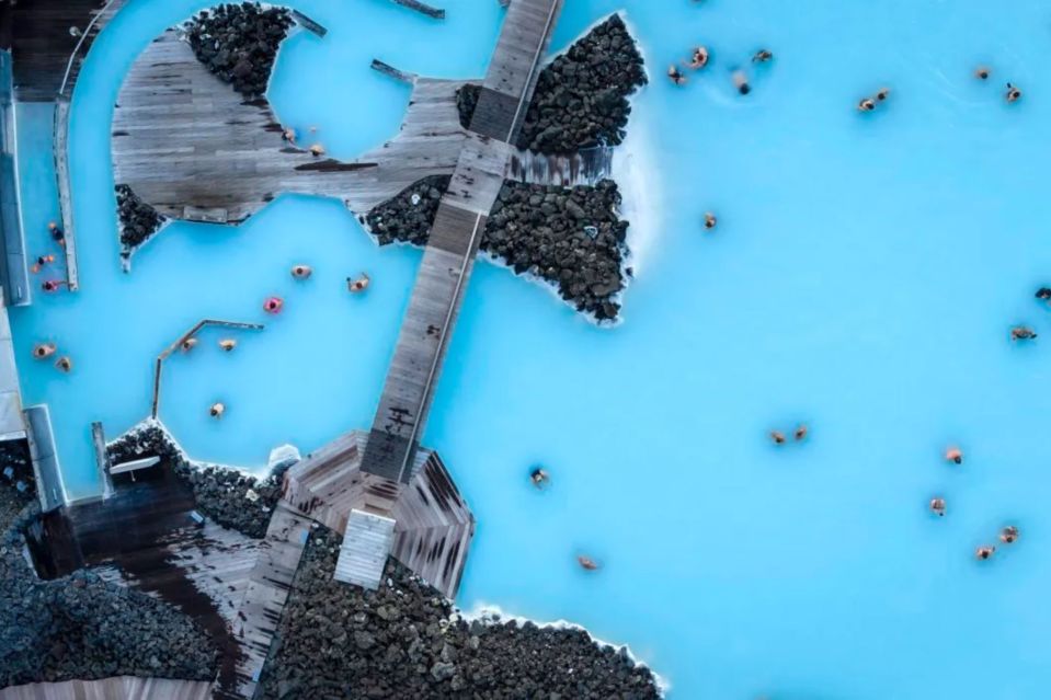 An image collage containing 1 images, Image 1 shows Aerial view of people bathing in the Blue Lagoon, Iceland