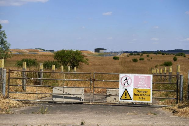 An image collage containing 1 images, Image 1 shows Locked gate with sign indicating a dangerous hazardous area on MOD property