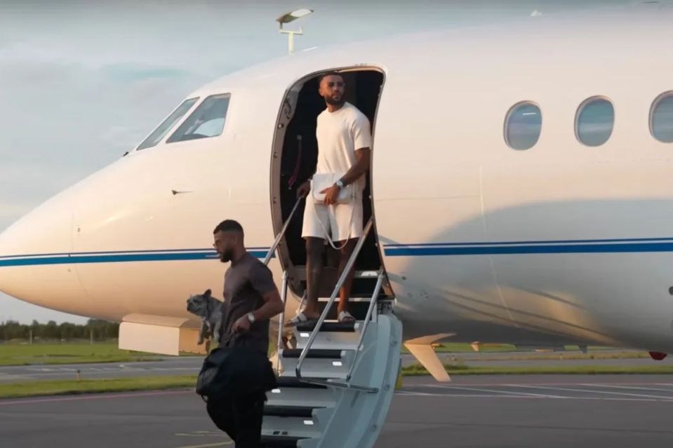 An image collage containing 1 images, Image 1 shows Two men boarding a private jet, one carrying a small dog