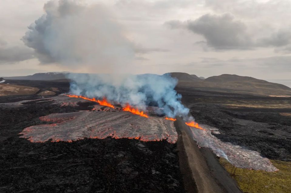 An image collage containing 1 images, Image 1 shows Aerial view of a volcanic eruption in Iceland
