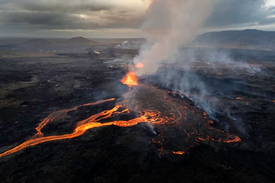 An image collage containing 1 images, Image 1 shows Aerial view of lava flowing from the Sundhnúkur volcano in Iceland