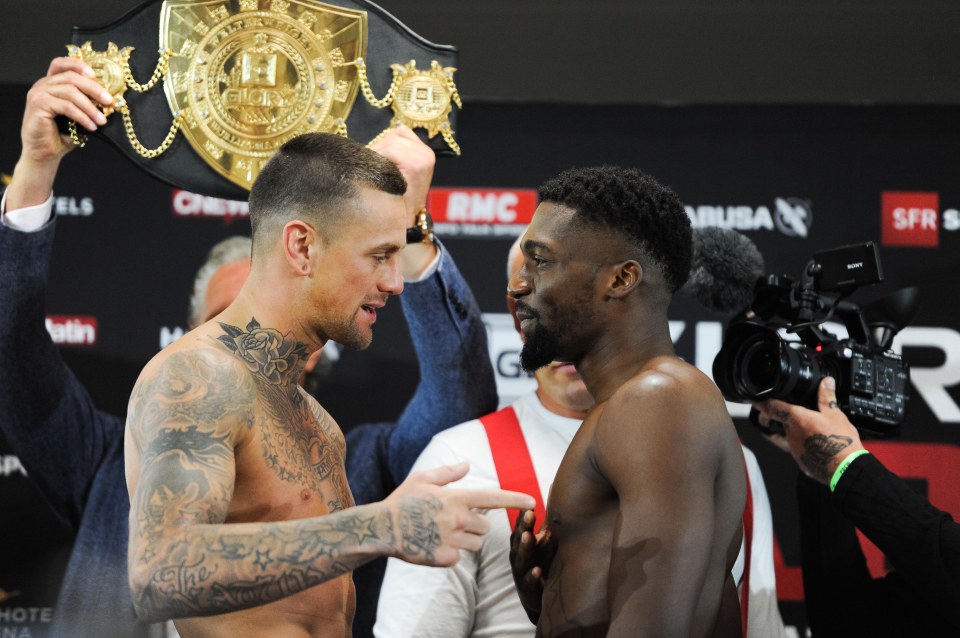 Nieky Holzken and Cedric Doumbe facing each other at a press conference.