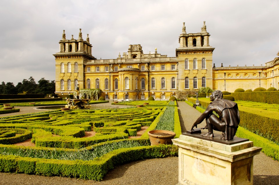 Blenheim Palace parterre garden with baroque facade.