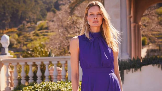 Woman in purple dress.
