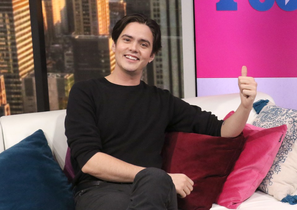 Miles Robbins giving a thumbs up.