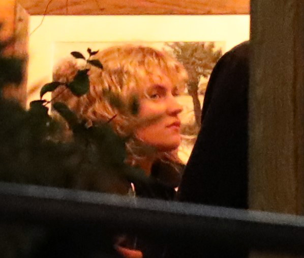 Woman with blonde hair at a party.