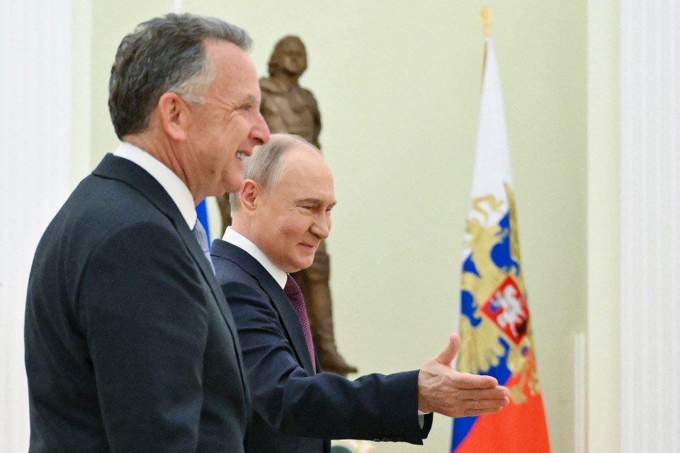 Vladimir Putin shaking hands with US Special Envoy Steve Witkoff.