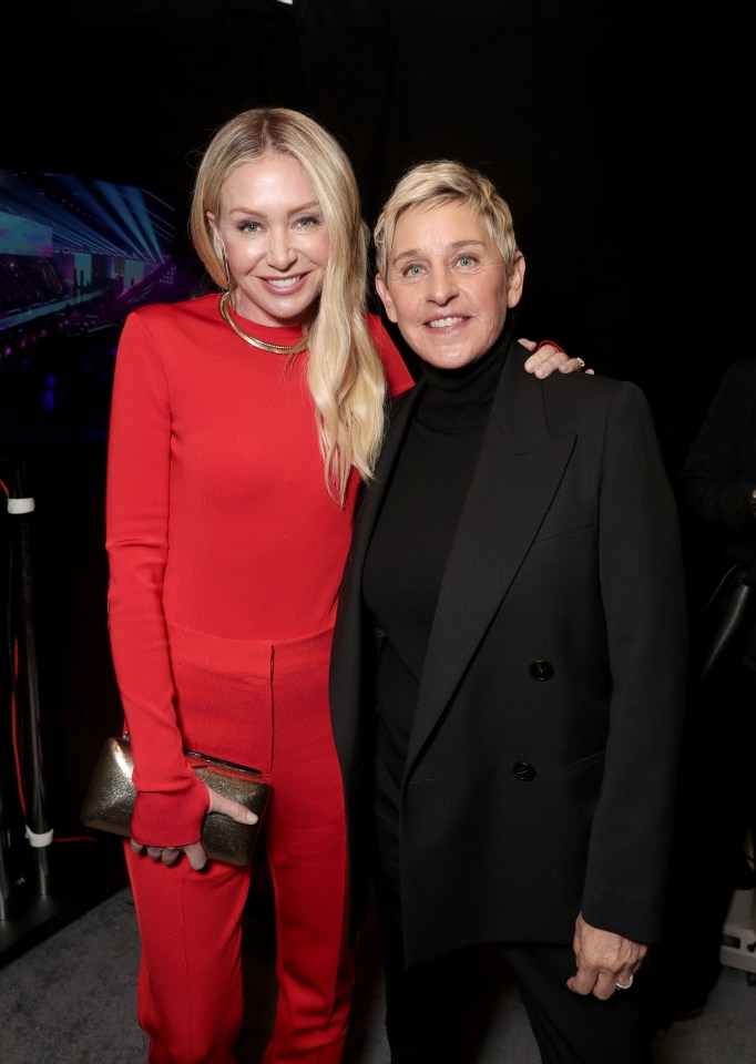 Portia de Rossi and Ellen DeGeneres backstage at the People's Choice Awards.