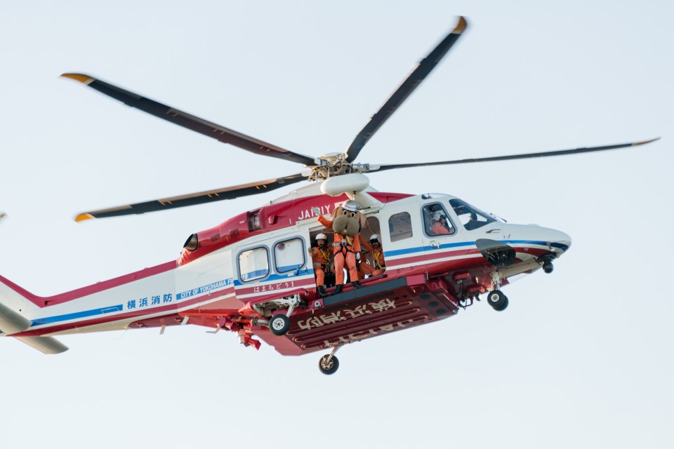 Yokohama fire station rescue helicopter in flight.