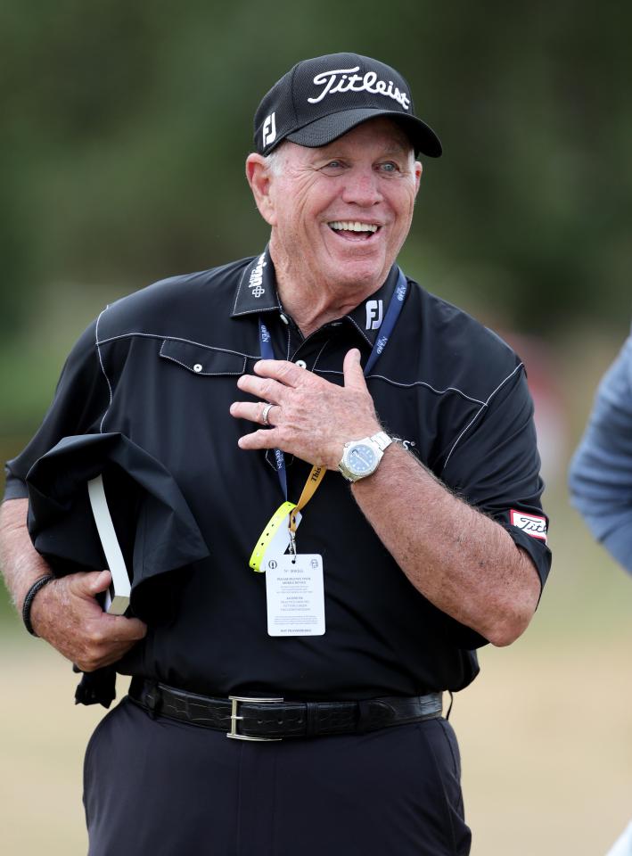 Coach Butch Harmon watching a practice round.
