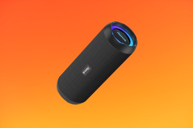 Black portable Bluetooth speaker against an orange background.