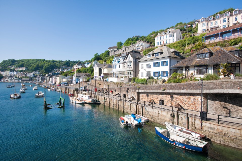 Riverside properties and boats in Looe, Cornwall, England.