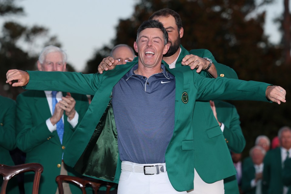 Rory McIlroy being awarded the Green Jacket at the Masters Tournament.