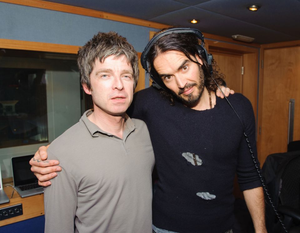 Noel Gallagher and Russell Brand at a radio show.