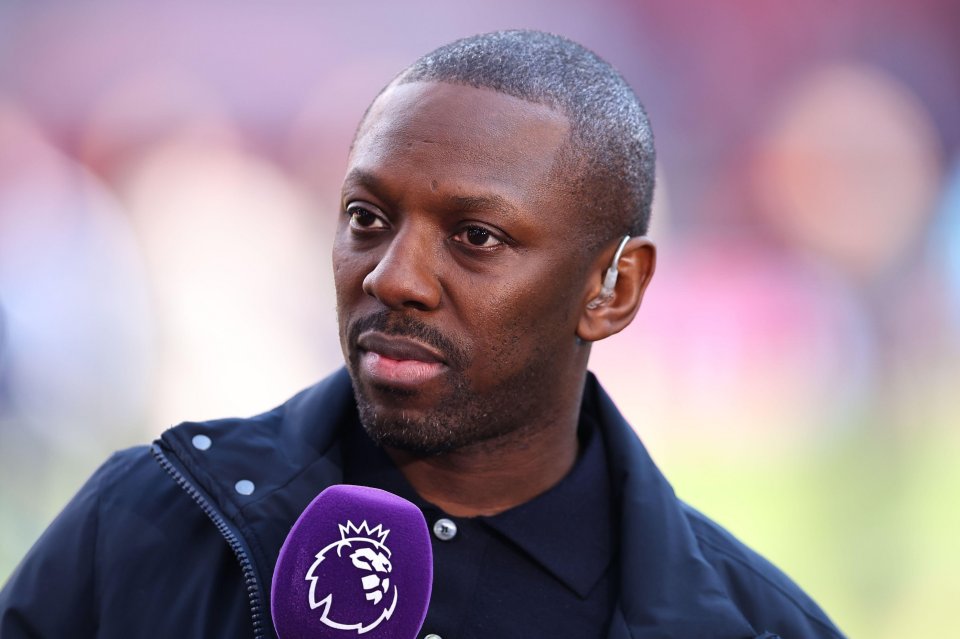 Shaun Wright-Phillips speaking into a Premier League microphone.