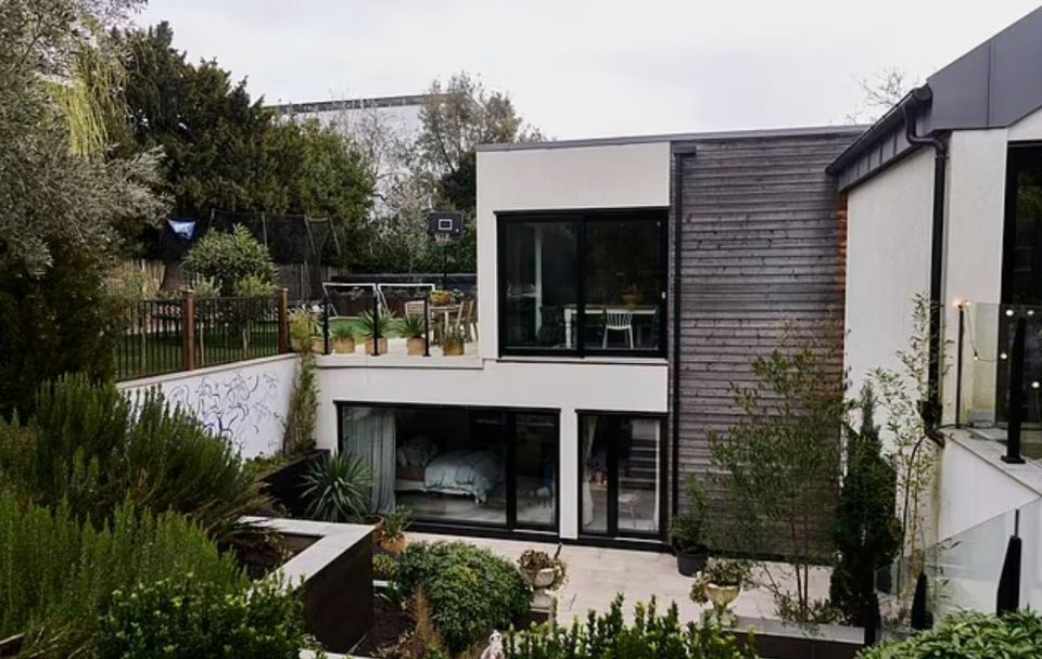 Allergy-proof house with large windows and patio.