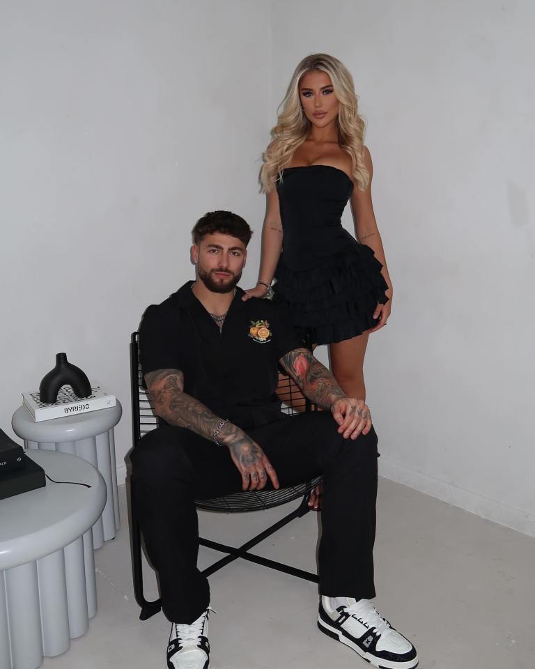 Sam Taylor and Leah in black outfits.