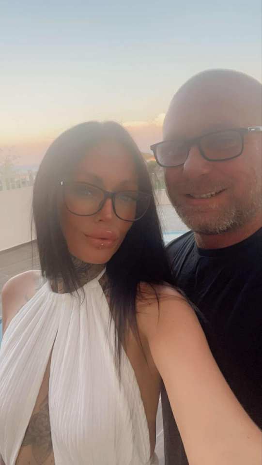 Couple posing for a selfie.