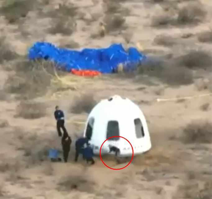 Crew recovering SpaceX Dragon capsule after landing.