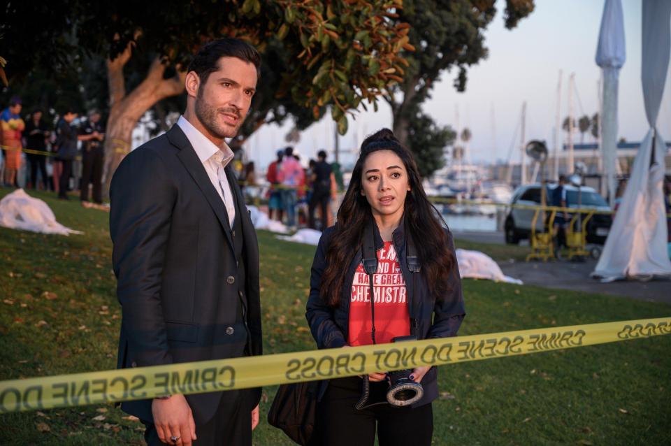 Tom Ellis and Aimee Garcia at a crime scene in Lucifer.