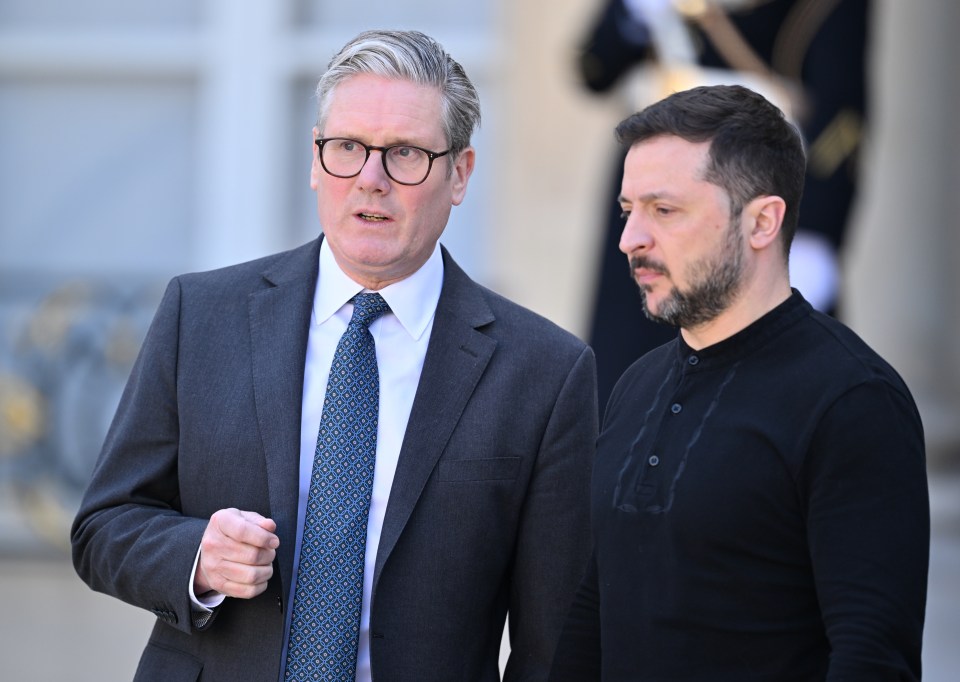 Keir Starmer and Volodymyr Zelenskyy leaving a summit.