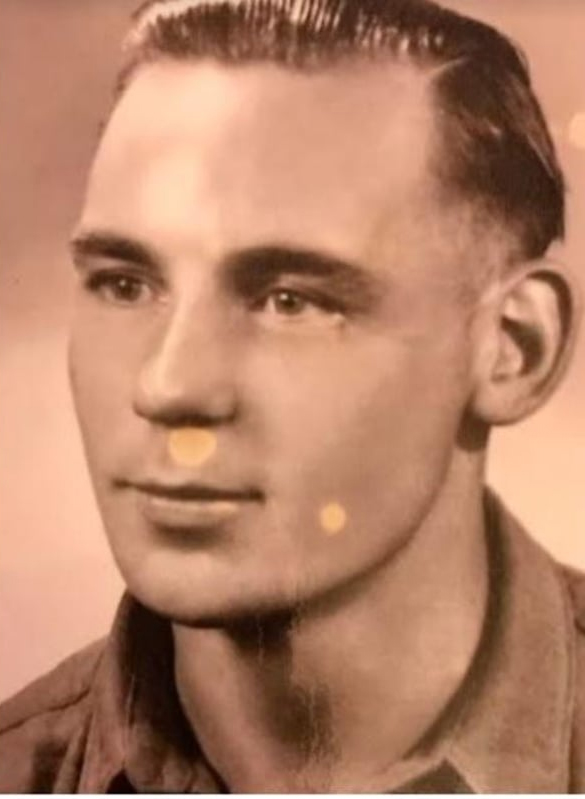 Black and white photo of Harry Birdsall, a WWII veteran who helped evacuate prisoners from Belsen concentration camp.