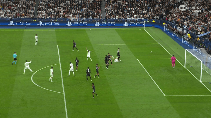 Soccer game in progress near the goal.
