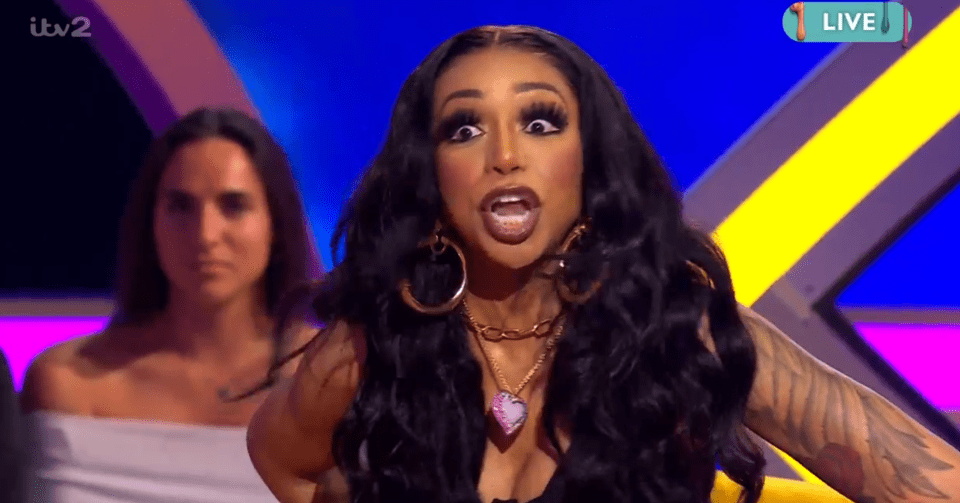 Tiffany Pollard on live TV, looking shocked.