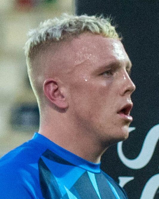 Head and shoulders profile of Benjamin Fry, Welsh rugby player.