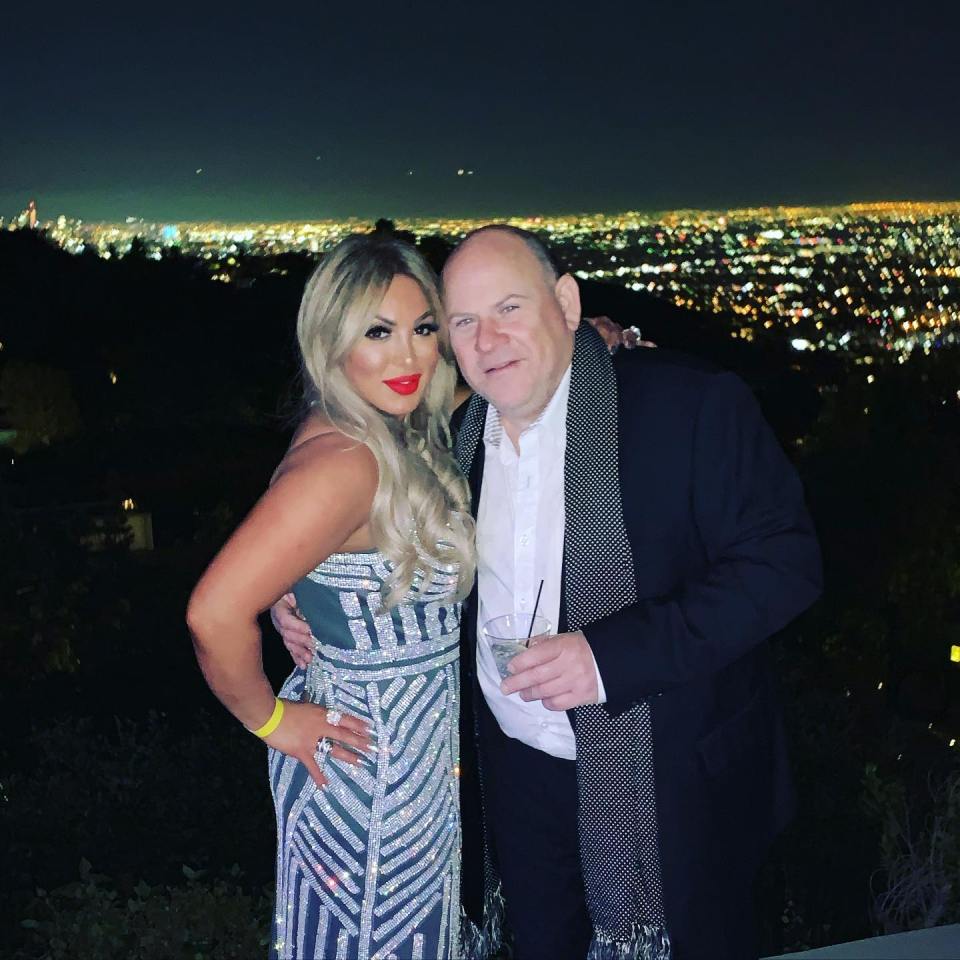 Niko Honarbakhsh and Karl Perman at night, overlooking a city.