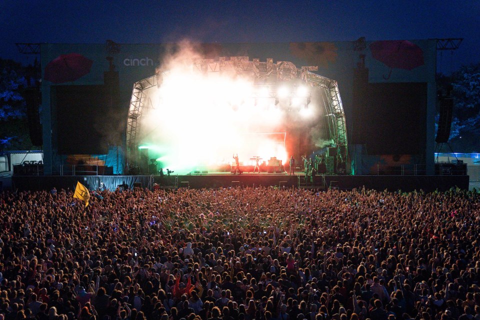 Wolf Alice performing at a music festival.