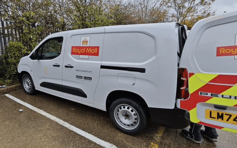 White Royal Mail delivery van.