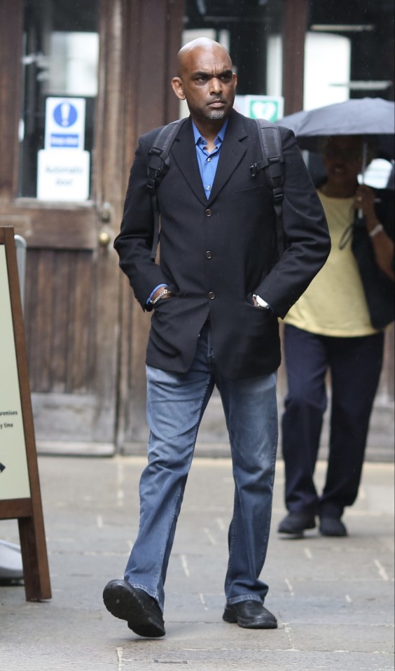 Singer RikRok Ducent outside a courthouse.