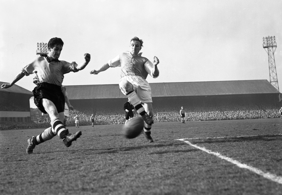 Black and white photo of a soccer game at Molineux in the 1950s.