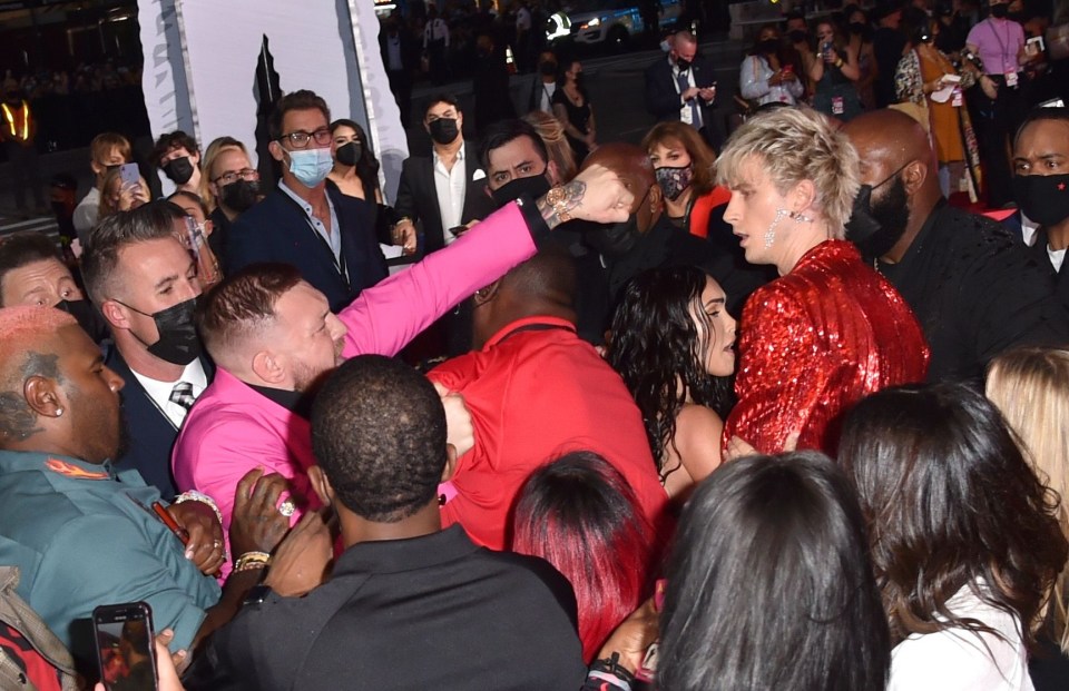 Conor McGregor punching Machine Gun Kelly at the MTV Video Music Awards.