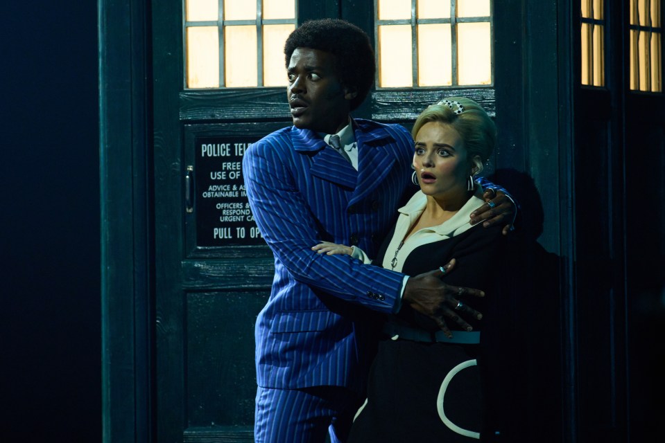 The Doctor and Ruby Sunday from Doctor Who, standing by the TARDIS.