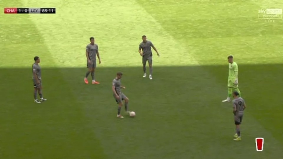 Soccer players on a field during a game.