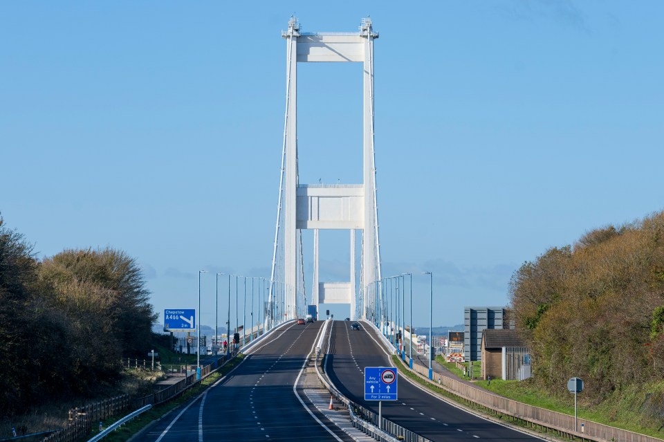 Severn Bridge connecting England and Wales, with few cars on the road.