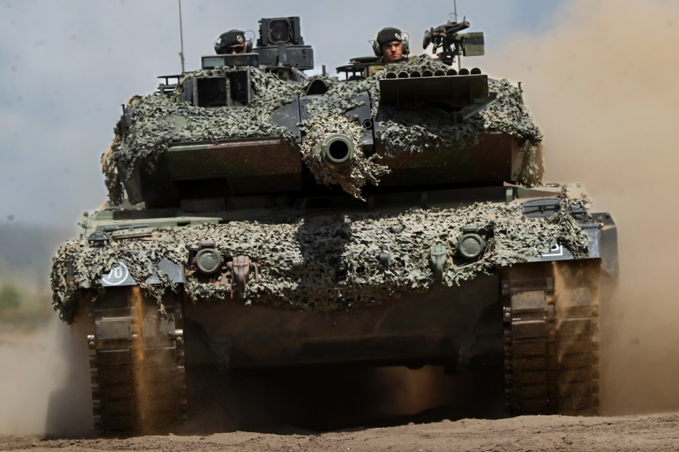 Leopard 2A6 tank moving during military exercise.
