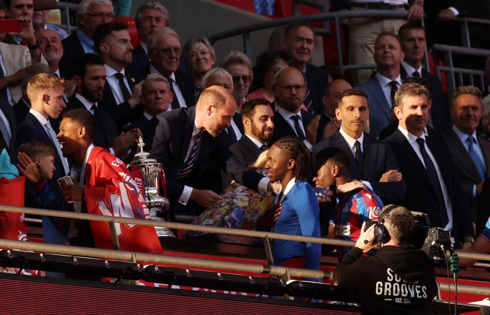 Crystal Palace players celebrating a soccer victory.