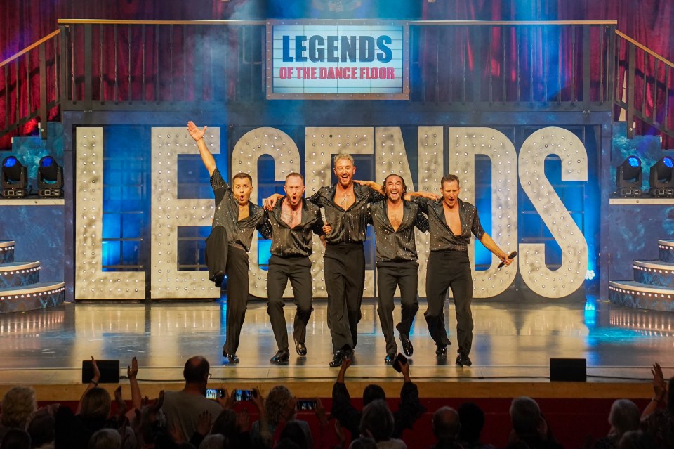 Four dancers on stage during a performance of Legends of the Dance Floor.